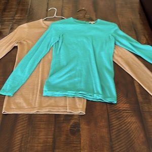 Blue and beige sweaters…